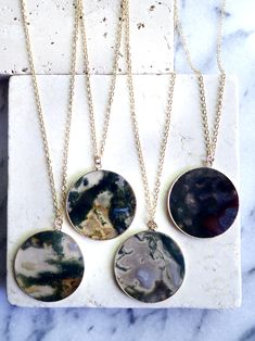 Moss agate pendant necklaces with lots of swirls and color variations. One of our new favorite gemstones make a perfect gift idea for gemstone jewelry lovers. Mens Leather Jewelry, Moss Agate Necklace, Raw Gemstone Jewelry, Agate Pendant Necklace, Agate Jewelry, Disc Necklace, Agate Necklace, Crazy Lace Agate, Raw Gemstones