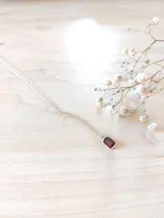 "Sterling Silver Dainty garnet Necklace, birthstone necklace. Size shown is 16\". Please choose your favorite necklace length at checkout. All lengths have a one inch extender, that way you'll have some wiggle room to play with the length. For example, if you choose a 14 inches necklace length, you'll have options to close the necklace at any length between 14 inches and 15 inches. Some of this charms are sold by themselves (no chain). If that option is available for this, you will have the opti Garnet Birthstone Jewelry Gift, Faceted Birthstone Necklace In Sterling Silver As Gift, Gift Faceted Birthstone Necklace In Sterling Silver, Dainty Garnet Jewelry For Gifts, Garnet Pendant Necklace With Birthstone, Dainty Garnet Necklace For Gift, Garnet Pendant Necklaces For Gift, Silver Garnet Birthstone Necklace, Elegant Silver Garnet Necklace