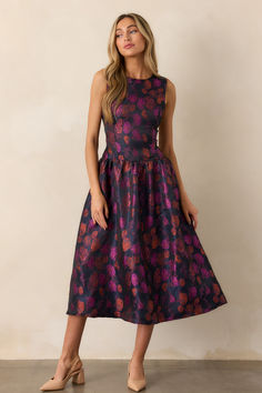 Indulge in the carefree and whimsical beauty of the Windswept Garden Floral Sleeveless Midi Dress. Perfect for any occasion, this dress boasts a stunning floral print and a flattering fit that will turn heads. Embrace your inner romantic and add this must-have piece to your wardrobe today! This purple dress features a floral design, a high rounded neckline, a sleeveless cut, a discrete back zipper with laced back detailing, a midi length and drop waistline. Women Club Dresses, Garden Purple, Dresses Birthday, Midi Dress Floral, Halter Bridesmaid Dress, Rush Dresses, Dress Bra, Elegant Dresses Long, Black Dresses Casual