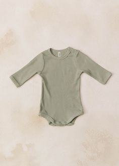 new and improved onesie design functioning snaps soft to the touch, stretchy 47% Rayon 47% Cotton 6% Spandex Cozy Pajamas, New And Improved, Onesies, Baby Clothes, Spandex, Grey, Long Sleeve, Blue, Clothes