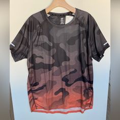 a t - shirt hanging on a clothes hanger