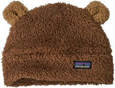 Keep your baby bundled from head to toe in the soft and adorable Patagonia® Furry Friends Hat. Created with polyester high-pile double-face fleece, this hat features bear-cub-style ears for extra cuteness. The double layer fabric adds warmth for a fun and fuss-free day playing in the leaves or enjoying the soft snow. Pair your little snow cub with a double-layer jacket and some booties for ultimate warmth this season. FEATURES: Bear cub style hat Regular fit High-pile double-face fleece Cub ears Patagonia Baby, Baby Patagonia, Fleece Hats, Patagonia Kids, Fleece Hat, Cozy Hat, Fabric Headbands, Toddler Hoodie, Bear Cubs