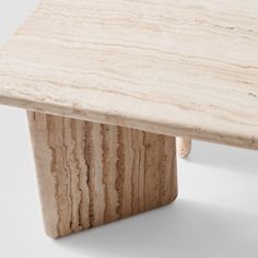 a close up of a wooden bench made out of plywood planks on a white background