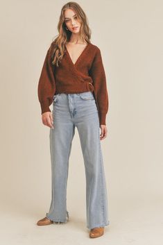 Belter Wrap Sweater Braided detail v-neckline // O-ring belt detail // Relaxed long sleeves 74% Acrylic 22% Polyester 4% Elastane Wrap Sweater Top, Wrap Around Sweater, Hourglass Sweater, Wrap Cardigan Outfit, Wrap Sweater Outfit, Hourglass Outfits, Style Essence, Jeans For Woman, Baggy Jean