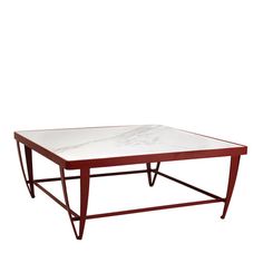 a white marble top coffee table with red metal frame and legs, against a white background