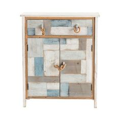 a white and blue cabinet with two doors on the front, one door open to reveal a patchwork design