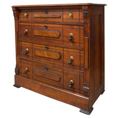 an old wooden dresser with many drawers