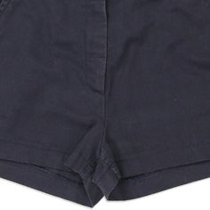 Description:Vintage Calvin Klein navy shorts, fit a UK size 8 - mid rise with a 28" waist. Size conversion: US Size: 4EU Size: 36IT Size: 40 RISE TYPE: Mid RiseWAIST: 28 inches / 71cmsINSEAM: 2 inches / 5cmsRISE: 10 inches / 25cmsGENDER: womens CONDITION: very good.STYLE: shortsERA: 1990sCOLOUR: navyFABRIC: cotton Navy Cotton Shorts With Short Leg, Navy Shorts With Pockets, Navy High Waist Shorts For Summer, Classic Fitted Jean Shorts, Navy High-waist Shorts For Summer, Navy High-waisted Shorts For Spring, Classic Blue Shorts With Short Inseam, Navy Fitted Shorts For Spring, Classic Navy Summer Bottoms