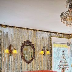 a living room filled with furniture and a chandelier