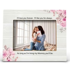 a mother's love frame with pink flowers on it and the words i love you forever