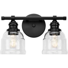 two light bathroom fixture with clear glass shades and black metal finish, on an isolated wall