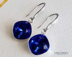 Wedding Majestic Blue Sapphire Royal Cobalt Blue Colored Crystal Silver Dangle Bridal Bridesmaids Earrings. PLEASE READ ITEM DESCRIPTION and SHOP POLICIES before placing your order, and contact me with any questions! EARRINGS are about 1.18 inch (3cm) long from top of earring wire to bottom. MATCHING NECKLACE: https://www.etsy.com/listing/662538760/blue-crystal-charm-necklace-royal-blue?click_key=1d0a712ac1d5c6c68b4168173e27ed3192c406e2%3A662538760&click_sum=489927c7&ref=shop_home_active_20&cns= Royal Blue Silver Wedding, Blue Silver Wedding, Blue Silver Weddings, Blue Bridal Earrings, Blue Wedding Jewelry, Blue Sapphire Jewelry, Earrings Sapphire, Bridesmaids Earrings, Crystal Wedding Jewelry