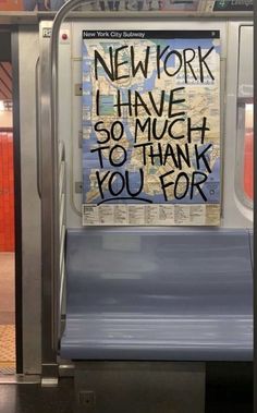 a subway car with graffiti written on the door and in writing that says new york i have so much to thank you for