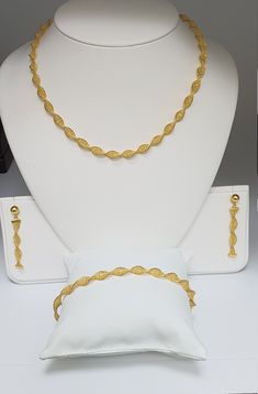 Absolutely Stunning Fancy Twisted Necklace,Earrings & Bracelet Set  22K Yellow Gold Total Gold Weight :-31.1 Grams  22K Necklace Gold Weight :- 19.1 Grams Necklace Length :- 20'' Inches  22K Earrings Gold Weight :- 4.8 Grams Earrings Length :-1.75 Inches  22K Bracelet Gold Weight :- 7.2 Grams  Bracelet Length :- 7 Inches  Packaging : Elegant Wooden Box  Shipping Free in UK Shipping World Wide : See Policy Payment : PayPal, Credit Card, Bank Transfer Returns Policy : 14 Days Hassle Free Refund  Y Plain Gold Necklace, Twisted Necklace, Pearl Diamond Pendant, 22k Gold Necklace, Gold Jewellry, 22k Gold Jewelry, Gold Chain Design, Gold Bridal Jewellery Sets, Gold Bangles Design