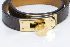 Hermes Kelly Bracelet.HERMES Paris Kelly Double Tour brown leather wrap bracelet in very good condition. Issued in 2008 (marked L in a square). Collectors item! Approximate Measurements: Total Length 15", Width 0.5" (best suitable for small/medium wrist). Made in France. Luxury Designer Brown Leather Bracelet, Luxury Brown Leather Bracelet, Kelly Double Tour Bracelet, Hermes Clip Bracelet, Hermes Leather Bracelet, Hermes Paris, Genuine Love, Leather Wrap Bracelet, Leather Wraps