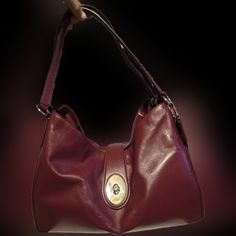 Leather Burgundy Coach Bag. Used A Few Times. Has Been Stored In A Dust Bag. I Believe It Was Purchased In 2018. It Is In Very Good Condition. No Stains. A Few Leather Winkles From Storing, Silver Front Claps Works And Has A Few Small Minor Scratches On It. 2 Large Compartments. 1 Middle Zipper Compartment. All Zippers Work Perfectly. Smoke-Free Home. The Original Price Was $358 Coach Burgundy Shoulder Bag With Gold-tone Hardware, Coach Soft Leather Hobo Bag For Shopping, Everyday Burgundy Bag With Gold-tone Hardware, Coach Leather Hobo Bag For Shopping, Burgundy Soft Leather Evening Shoulder Bag, Evening Burgundy Soft Leather Shoulder Bag, Coach Shoulder Bag With Silver-tone Hardware For Everyday, Coach Hobo Bag With Leather Handles For Daily Use, Burgundy Shoulder Bag With Gold-tone Hardware For Shopping