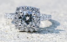 a fancy diamond ring on the ground