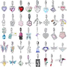 a bunch of charms that are on a white background