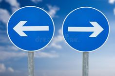 two blue street signs with an arrow pointing in opposite directions against a cloudy sky background