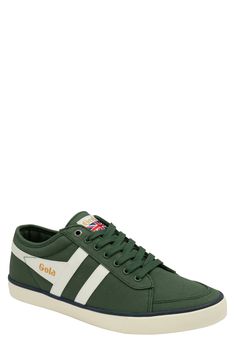 Contrasting stripes refine a comfy, versatile canvas sneaker set on a durable rubber sole. Lace-up style Textile upper and lining/rubber sole Imported Casual Green Canvas Shoes With Gum Sole, Casual Sneakers With Canvas Lining, Casual Canvas Sneakers With Canvas Lining, Casual Green Canvas Shoes, Green Sporty Canvas Shoes With Vulcanized Sole, Sporty Green Canvas Shoes With Vulcanized Sole, Green Casual Sneakers In Textile, Green Canvas Sneakers With Cushioned Footbed, Casual Sneakers With Canvas Lining And Round Toe