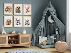 a child's room with blue walls and pictures on the wall, including a dog bed