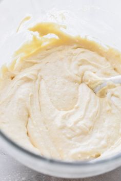 a bowl filled with batter sitting on top of a counter