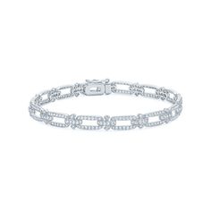 Elegant open links of round brilliant diamonds circle the wrist with eye-catching sparkle. Each stone is cut to the highest standards and handset by Kwiat artisans in 18k white gold. This bracelet is designed to be light and airy, with a graceful use of negative space that allows skin to peek through. White Gold Diamond Bracelet, Bracelet With Diamonds, Diamond Bangles, Diamond Necklace Designs, Diamond Jewelry Designs, White Gold Bracelet, Circle Diamond, Classy Jewelry, Diamond Bangle