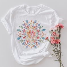 Mandala Shirt, Floral Mandala T-Shirt, Spring Floral Shirt, Gifts for Her, Flower Shirt, Florist Gift, Gift for Bestie WELCOME TO THE FLOWERED MERCANTILE If you're looking for eye-catching items from quality t-shirts to tea towels with a touch of uniqueness, you've come to the perfect destination. Please take time to read descriptions and shop policies HOW TO ORDER:  To ensure a seamless delivery of your order, kindly double-check your preferred color and size before proceeding. Our collection o Bohemian Multicolor Print Short Sleeve T-shirt, Spring Multicolor Sublimation Print T-shirt, Multicolor Floral Print Crew Neck T-shirt, Multicolor Floral Print Short Sleeve T-shirt, Cotton T-shirt With White Print, Printed Cotton T-shirt With White Print, Short Sleeve Cotton Tops With Printing, Bohemian Multicolor Sublimation Print T-shirt, Multicolor Sublimation Print Cotton T-shirt