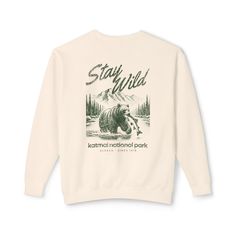 Katmai Alaska National Park Sweatshirt, Granola Girl Aesthetic Crewneck, Front & Back Graphic Pullover, Outdoorsy Style . Comfort Colors Crewneck Details: Medium-heavy fabric Relaxed fit Sewn in twill label OEKO-TEX certified low-impact dyes CARE INSTRUCTIONS: All items are machine washable, inside out, using cold water. Please hang to dry. Do not bleach or dry clean. SHIPPING NOTE: More than 1 item in an order may ship separately, so you can receive products as soon as they are ready, don’t be Beige Crew Neck Sweatshirt With Graphic Print, Winter Graphic Print Cream Tops, Winter Cream Graphic Print Tops, Winter Cream Tops With Graphic Print, Cream Winter Top With Letter Print, Cream Letter Print Top For Winter, Cream Tops With Letter Print For Winter, Fall Cream Graphic Print Tops, Relaxed Fit Cream Sweater With Graphic Print