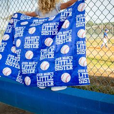 Enjoy your favorite sporting events in comfort with this cozy Bitty Bleacher Blanket! Its 30x40 size is the perfect fit for the smallest of fans , and its personalized design with 11 colors and 12 sports and activities will have your little looking snazzy as you snuggle up in the bleachers. Now, that's cheering in style! Features: - 11 Colors to choose from - 12 Sports and activites - 30 x 40 inches - 100% Polyester Minky Soft Touch Fleece Fabric - Lightweight and airy - Machine washable, tumble Sports Blanket, The Bleachers, Personalized Hangers, Beach Towel Blanket, Cheer Gifts, Wooden Name Signs, Kids Cups, Cheer Team, Burp Cloth Set