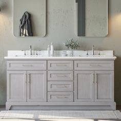 a bathroom vanity with two mirrors above it and a rug on the floor next to it