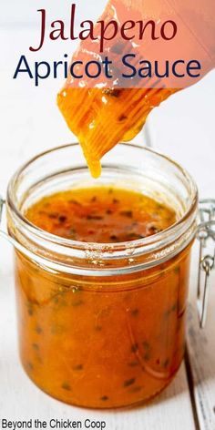 a jar filled with jalapeno apricot sauce