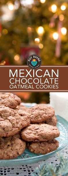 mexican chocolate oatmeal cookies on a plate with christmas lights in the background