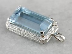 Aquamarine is a popular stone for its beautiful, watercolor hue. This emerald cut gem is an icy, sky blue with hints of deeper greens within its depths! The surrounding diamonds bring plenty of light into this simple, easy to wear, etched platinum pendant. This pendant does not come with the chain shown. Please feel free to contact us, we will help you find the perfect chain for your style and budget! Metal: Platinum Gem: Aquamarine 3.83 Carats Gem Measurements: 19.7 x 9.9 mm, Emerald Cut Accent Princess Jewelry, Deep Green, March Birth Stone, Everyday Jewelry, Eternity Bands, Aquamarine, Citrine, Emerald, Jewelry Inspiration