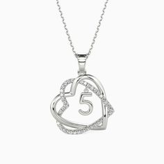 This intricately crafted pendant delicately embraces the theme of love. It features two entwined hearts elegantly paved with round gemstones along the contours. Besides, a customizable number dangles in the center of the hearts. An ideal gift to express love or commemorate an important date, this pendant delivers beauty through its intricate design that will surely be treasured for years to come. *Each piece is handmade, resulting in a potential variance of 0.1-0.2mm during measurement. Please r Entwined Hearts, My Better Half, Express Love, Better Half, Important Dates, Intricate Design, Personalized Necklace, Personalized Jewelry, Stone Color