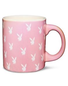 Hop right into your morning with this pink Playboy coffee mug! This stylish mug is the perfect pick-me-up to get your day going. Officially licensed Exclusively at Spencer's Dimensions: 4.3" H x 5.7" W x 4" D Capacity: 20 oz. Material: Ceramic Care: Hand wash Imported Pink Playboy, Spencers Gifts, Goth Home, Goth Home Decor, Playboy Bunny, Black Horse, Cute Room Decor, Coffee Art, Kitchen Supplies