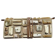 Rare Tom Ford for Yves Saint Laurent Rive Gauche Embellished Clutch / Shoulder Bag 2002 Collection 100% Leather, Beige Suede, Stones Embellishment, Brown Leather Tie, Removable Shoulder Strap, Snap Closure, Inner Pocket, Brown Suede Lining. Measurements: Length - 10.75 inches, H - 4.5 inches, W - 1.5 inches. Made in Italy. Excellent condition, Comes with YVES Dust Bag. Matching Suede Jacket with the Rings Available in Our Store. Vintage Clutch Bag, Tom Ford Bag, Hermes Kelly Bag, Embellished Clutch, Vintage Ysl, Vintage Handbag, Yves Saint Laurent Bags, Vintage Shoulder Bag, Vintage Clutch