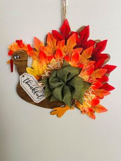 a turkey decoration hanging on the wall