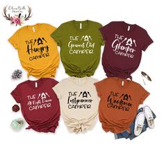 Get ready for your next camping adventure with these personalized group camping shirts! Whether you're embarking on a weekend adventure with your closest buddies or enjoying a family outdoor retreat, these shirts will add a touch of uniqueness to your camping experience. Handcrafted with love, each shirt can be personalized to make it truly one-of-a-kind. Made from soft and breathable fabrics, these shirts are designed to keep you comfortable and stylish throughout your camping trip. So gear up, create memories, and stand out in the great outdoors with our personalized group camping shirts! ➡️ Choose Size and Color of shirt. ➡️ Add your personalization - choose from examples given, or use your own! ➡️ Add each shirt to cart individually. 🏕 - SHIRT SPECIFICATIONS & SIZING -🏕 All shirts ar Group Camping Shirts, Camping Shirts, Group Camping Shirts Funny, Annual Camping Trip Shirts, Family Camping Trip Shirts, Bff Hoodies, Affordable Casual T-shirt For Camping, Group Camping, Camping Shirts Funny