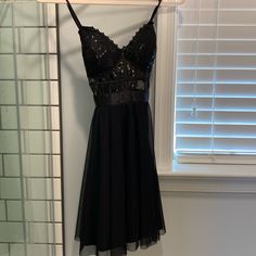 This Is Such A Cute Dress For A Dance, A Special Event, Etc. This Dress Was Worn Twice And Still Looks Brand New! There Is Delicate Lacing On It And Gorgeous Sparkles. This Was Dry Cleaned As Of 11/13/2023 And Has Never Left It’s Covering Until These Photos Were Taken Today. Black V-neck Mini Dress For Homecoming, Spaghetti Strap Dress With Lace Bodice For Night Out, Flirty Sleeveless Dress With Lace Bodice, Spaghetti Strap Party Dress With Lace Trim, Black Sleeveless Homecoming Dress, Date Night Dress With Lace Bodice And Spaghetti Straps, Party Dress With Lace And Lined Bodice, Black Mini Dress With Spaghetti Straps For Homecoming, Spaghetti Strap Dress With Lace Bodice For Date Night