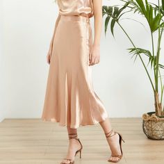 Slm Dust Rose Satin Skirt - Eurockk.com Elegant Pink Satin Skirt, Feminine Satin Flowy Skirt, Feminine Flowy Satin Skirt, Elegant Pink Satin Bottoms, Feminine Midi Satin Skirt, Feminine Satin Lined Skirt, Feminine Long Satin Skirt, Chic Pink Wedding Skirt, Elegant Lined Gold Skirt