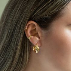 Classic Gold conch ear cuff that will hug your conch perfectly. Perfect to wear alone or paired with other huggie earrings..| Lead and Nickel free. Sold as a SINGLE earring, purchase 2 for a pair Gold Vermeil (Thick layer of Gold plated over Sterling Silver) Width 3mm(0.12in) Inside Diameter 9mm(0.35in) Adjustable sizing #J522-G Trendy Huggie Ear Cuff For Pierced Ears, Adjustable Huggie Wrap Earrings For Pierced Ears, Tarnish Resistant Huggie Ear Cuff, Small Hoop Ear Cuff With Ear Wire, Gold Plated Huggie Ear Cuff, Adjustable Huggie Ear Cuff With Ear Wire, Gold Conch Hoop, Chunky Conch Hoop, Gold Tarnish-resistant Small Hoop Ear Cuff