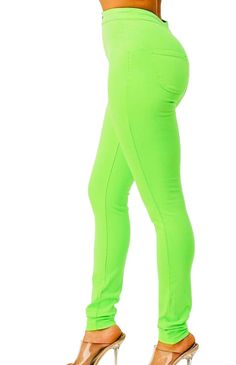 These sleek, skinny-fit pants offer both comfort and style with a high-rise waist and stretch fabric that accentuates your curves for a flattering silhouette. With round back pockets, these pants add both function and fashion to your everyday look. Skinny fit Stretchy Round back pockets Button closure Available in white, neon purple and neon green Solid Color Fitted Mid-rise Leggings, Versatile Tight Mid-rise Bottoms, Versatile High-waisted Stretch Pants, Fitted High-rise Elastane Leggings, Fitted Mid-rise Pants, High Waist High Stretch Cotton Pants, High Stretch High Waist Cotton Pants, Trendy Stretch Cotton Bottoms, Trendy Cotton Stretch Bottoms