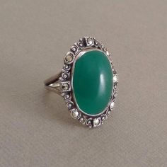 "See More Antique Jewelry here: https://www.etsy.com/shop/YearsAfter?search_query=antique An Exquisite Antique Art Deco Sterling Ring embellished with Chrysoprase or Green Chalcedony Gemstone with a Scroll Frame of Brilliant Prong-set Marcasites on a Long Sterling Silver Setting with Split Shank Sides, Hallmarked STERLING, Size 5, Weight 4.9 grams circa 1920's! Measurements: Size 5 Close Fitting (5 US). Face is approx. 1\" height by 3/4\" across. Band is about 1/8\" in width. This Chrysoprase Ri Vintage Modernist Jewelry, Mexican Silver Jewelry, Chrysoprase Ring, Topaz Birthstone, Marcasite Ring, Modernist Jewelry, Green Chalcedony, Scottsdale Az, Victorian Jewelry