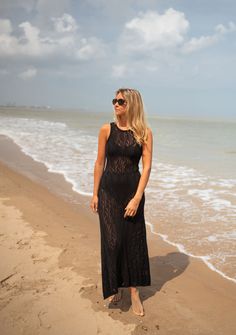 This stunning crochet maxi dress features a drawstring to tie at the neck, an open back, and an intricate crochet pattern. The dress is transparent and slightly tight, with the versatility for casual days at the beach or breezy nights. Sizes: S-M / M-L S-M: Length 45.67 in - Width 11.02 in M-L: Length 47.24 in - Width 11.81 in 100% cotton Washing: handwash Lace Maxi Dress For Beach Cover-up, Lace Maxi Dress Beach Cover-up, Lace Maxi Dress For Beach Season, Lace Maxi Dress For Beach, Lace Maxi Dress For The Beach, Lace Crochet Maxi Dress For Vacation, Summer Lace Maxi Dress For Beach Season, Beach Season Lace Maxi Dress, Summer Lace Maxi Dress For Beach