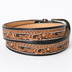 Black and Brown Tooled Leather Belt- Western Belts for Cowgirls. Hand-tooled, carved, and meticulously antiqued by skilled artisans, this belt showcases exceptional craftsmanship. Crafted from the finest Vegetable Tanned American Genuine Cowhide Leather, it embodies quality, style, and heritage. Expertly hand crafted from premium hand-tooled vegetable-tanned genuine cowhide leather. Features beautiful and intricate old west style saddle leather tooling, adding a touch of sophistication and charm to the overall design. The belt is equipped with a removable high-quality antique finish metal buckle featuring exquisite engraved textures, enhancing its overall aesthetic appeal and versatility.Beyond its stylish appearance, this belt offers exceptional durability, promising long-lasting wear and Western Style Hand Tooled Belt For Formal Wear, Formal Adjustable Engraved Belt, Classic Adjustable Hand Tooled Belt, Classic Adjustable Hand-tooled Belt, Traditional Adjustable Hand-tooled Belt, Belt Western, Cowgirl Belts, Tooled Leather Belts, Overall Aesthetic