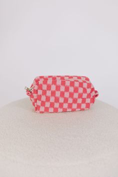 Freshen up your look with this bright pink and light pink checkered makeup bag! Make a bold choice and choose this bag to show off your style - it’ll take your makeup routine to the next level! Lined Approx. 8" x 4" x 3" Zipper closure Checkered Makeup Bag, Checkered Makeup, Nursing Friendly Tops, Free People Sandals, Thread Wallets, Nursing Friendly Dress, Pink Checkered, Exclusive Dress, Capri Blue