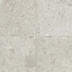 a tile floor with white and gray speckles