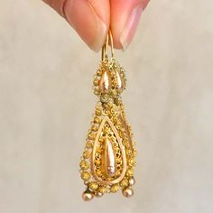 For Sale on 1stDibs - Pair of 14 karat gold dangle earrings crafted with a rich design of fine filigree and cannetille work. The earrings are very skillfully handcrafted. Each Ornate Rose Gold Filigree Jewelry, Victorian Style Ceremonial Dangle Earrings, Victorian Yellow Gold Earrings With Intricate Design, Antique Yellow Gold Wedding Earrings, Ornate 14k Gold Earrings, Antique Filigree Earrings For Ceremonial Occasions, Victorian Dangle Earrings Hallmarked, Victorian Hallmarked Dangle Earrings, Victorian Style Hallmarked Dangle Earrings