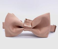 "ROSE GOLD BOW TIE. TRUE ROSE GOLD COLOR. ITALIAN SATIN. I hand-stitched this bow tie from the gorgeous Italian satin, softest texture ever, rose gold with a bit glossy face. Would be perfect for the Rose Gold WEDDING scheme, special event or an everyday wear. Can be made self-tie, or pre-tied. Accommodates neck sizes up to 18.5\", adjustable strap.  Add Matching POCKET SQUARE from here: https://etsy.me/3gdm0Vs Thanks for your interest in my pieces! Have a wonderful day! -Julia" Wedding Ties With Satin Finish, Satin Finish Bow Tie For Weddings, Satin Bow Tie Back Wedding Ties, Satin Wedding Bow Tie With Satin Finish, Fitted Gold Bow Tie For Wedding, Rose Gold Bow Tie, Rose Gold Tie, Bow Tie Groomsmen, Rose Gold Satin